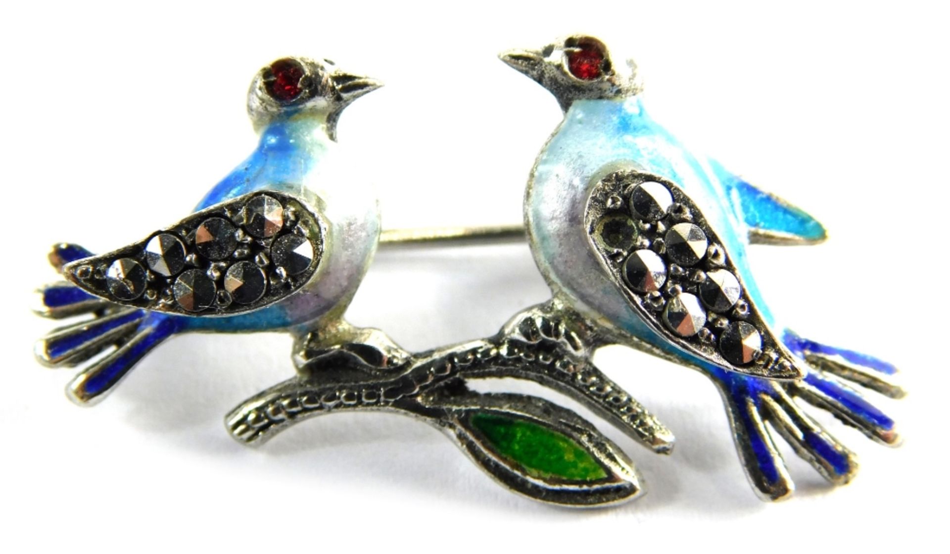 A costume jewellery bar brooch, formed as two birds, with enamel decoration, with marcasite wings an