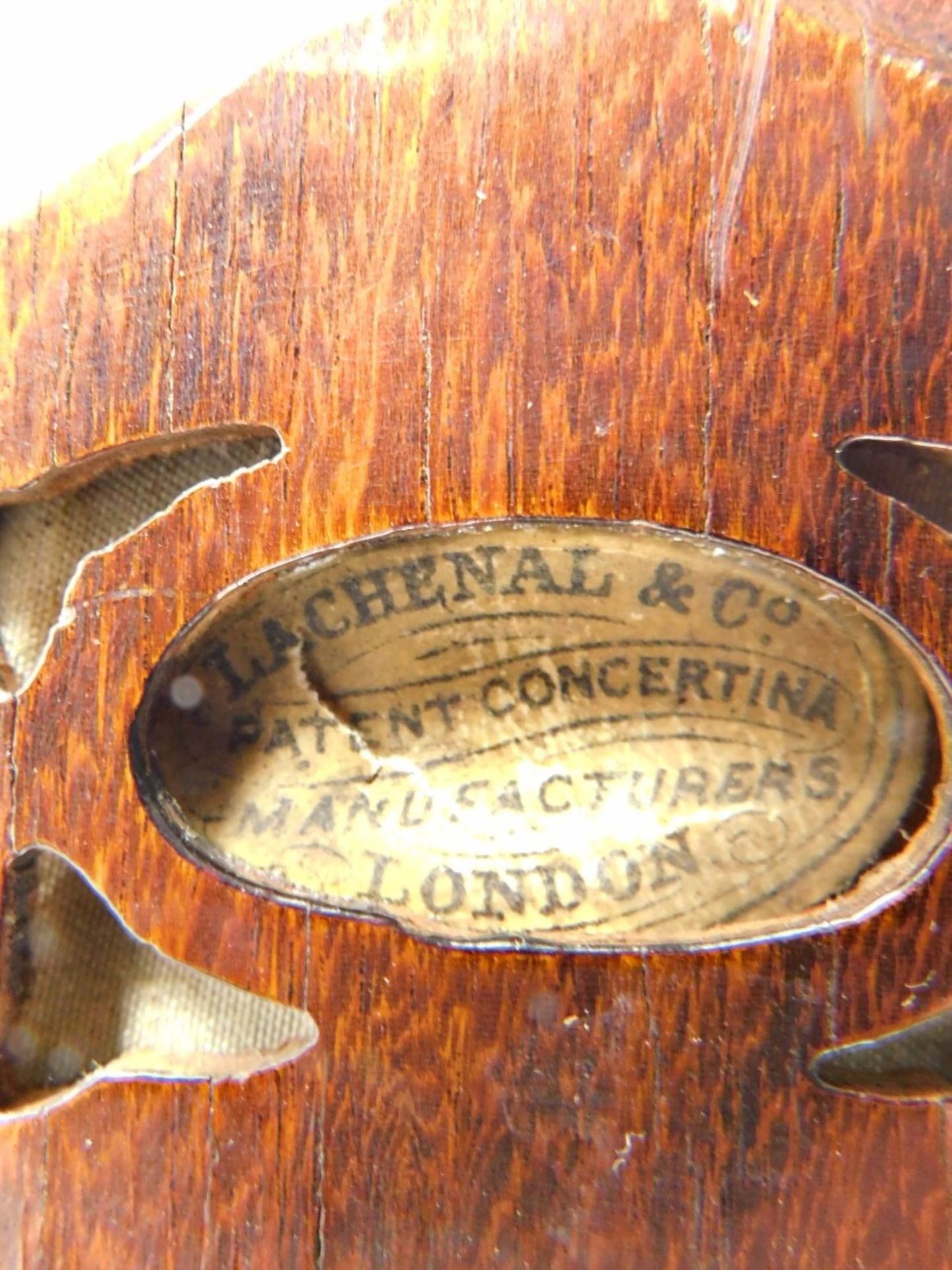 A 19thC Lachenal and Co London concertina, with 48 chrome buttons, in fitted case, 19cm high, labell - Image 4 of 5