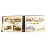 A Japanese lacquered postcard album, containing a number of 20thC postcards, world scenes, HRH Princ