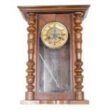 An early 20thC walnut Continental walnut cased wall clock, the 13cm diameter Roman numeric dial fitt