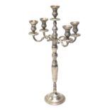 A modern silver coloured four branch candelabrum, with central dish holder, on baluster stem and cir