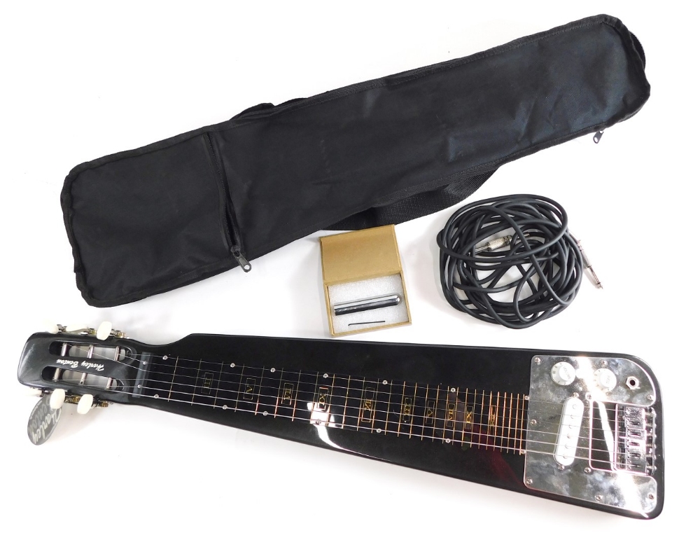 A Harley Benton Lap Steel slide guitar, with stand, in outer canvas case, 76cm long.