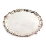 An Elizabeth II silver salver, by Parker Ellis Silver Co, piecrust and shell border, plain centre on