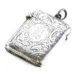 An Edward VII silver Vesta case, of oblong form, partially chased with ring top and match strike bas