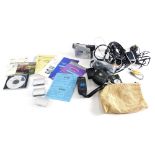 A Canon MV 600I digital camera, with various accessories, camcorder, charger, some partially boxed,