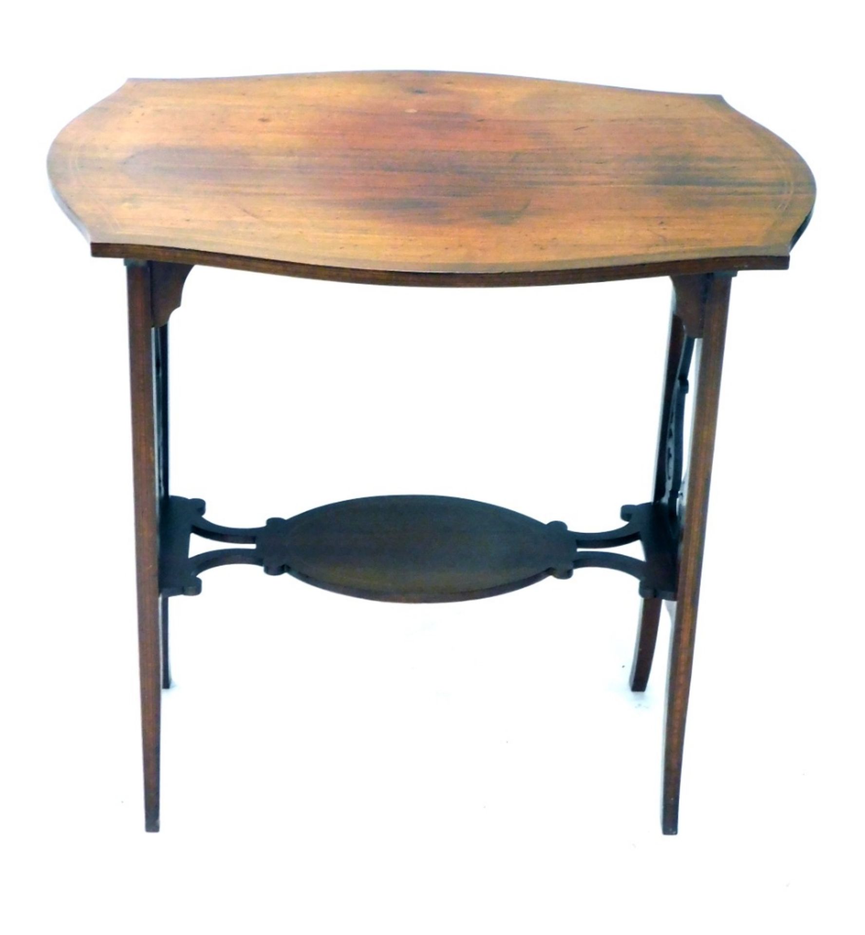 An Edwardian mahogany occasional table, the shaped top with a double line inlay, above lyre supports