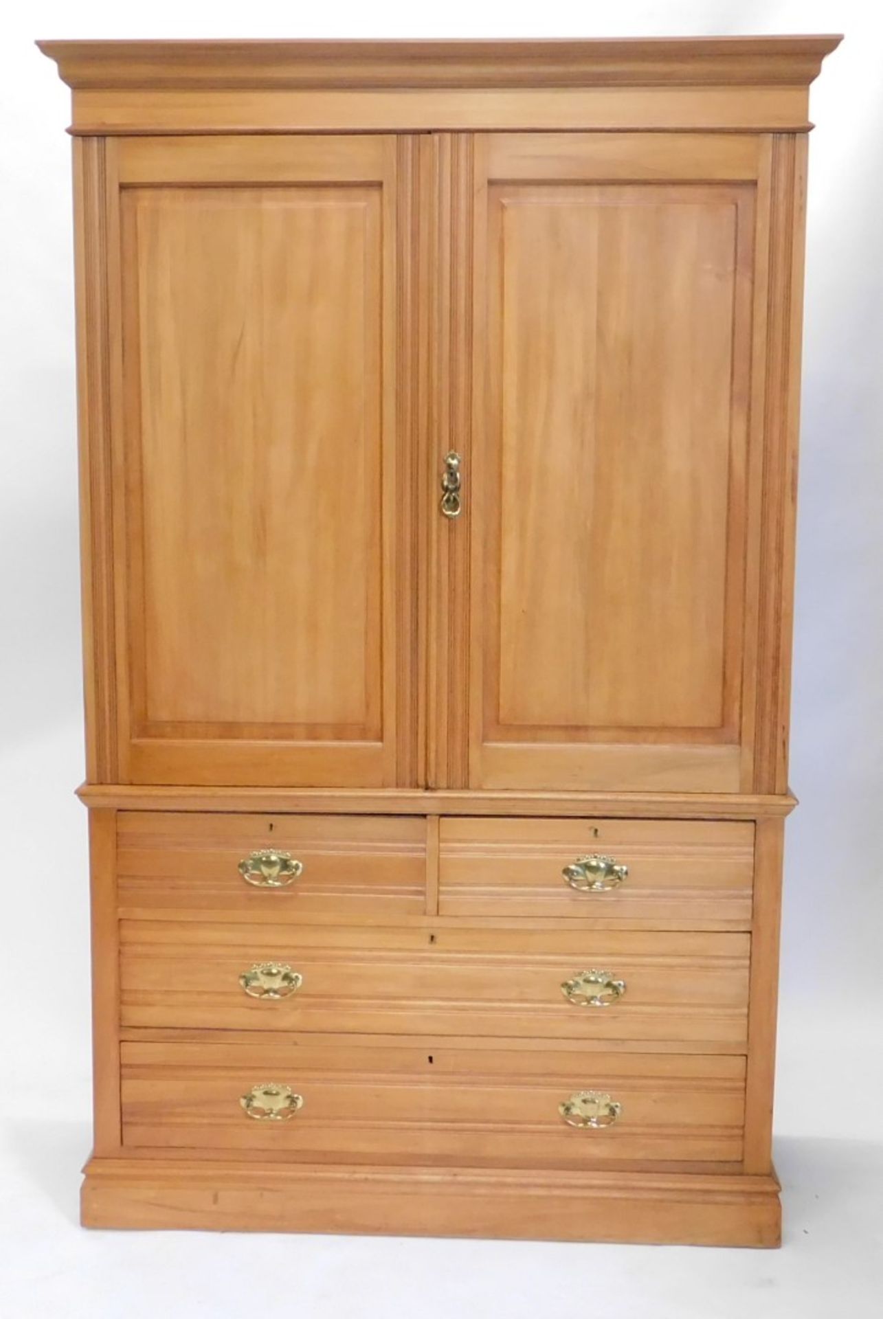 An Edwardian satin walnut bedroom pair, comprising press cupboard, with fitted interior, above two s