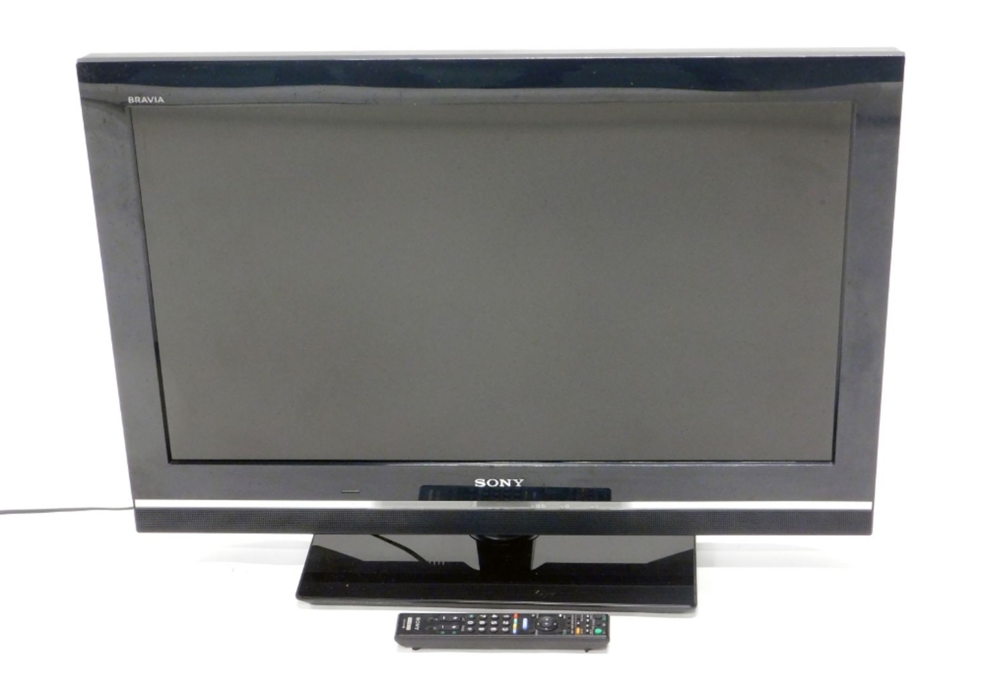 A Sony Bravia KDL-32V5500 32" television, in black, with wire and remote control.