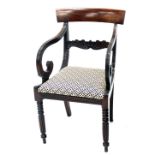 A Regency mahogany carver chair, with floral back splat, drop in seat in later floral Regency style