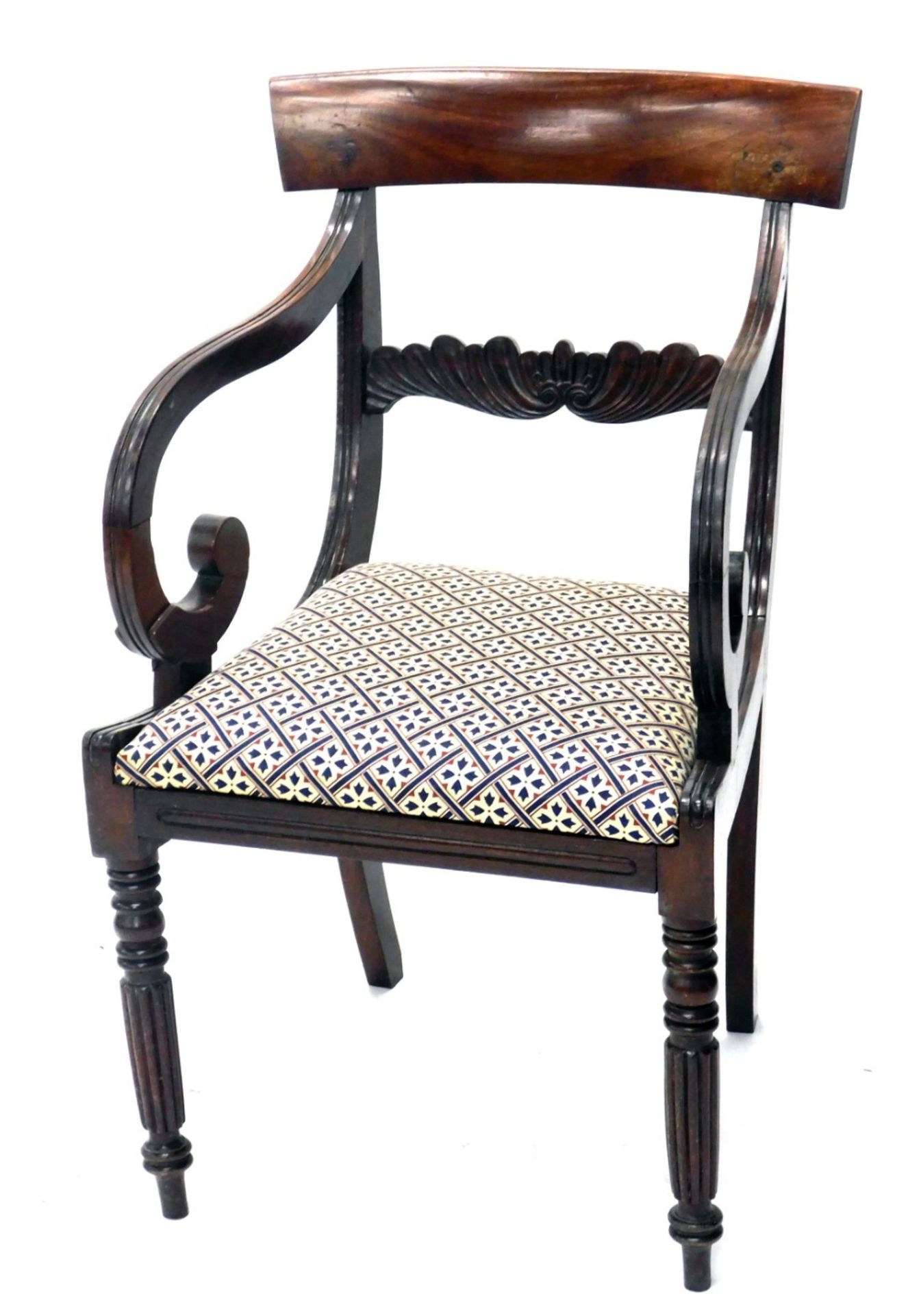 A Regency mahogany carver chair, with floral back splat, drop in seat in later floral Regency style