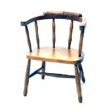 A 20thC ash and elm small captains chair, with spindle back, turned legs, and H stretcher, 51cm high