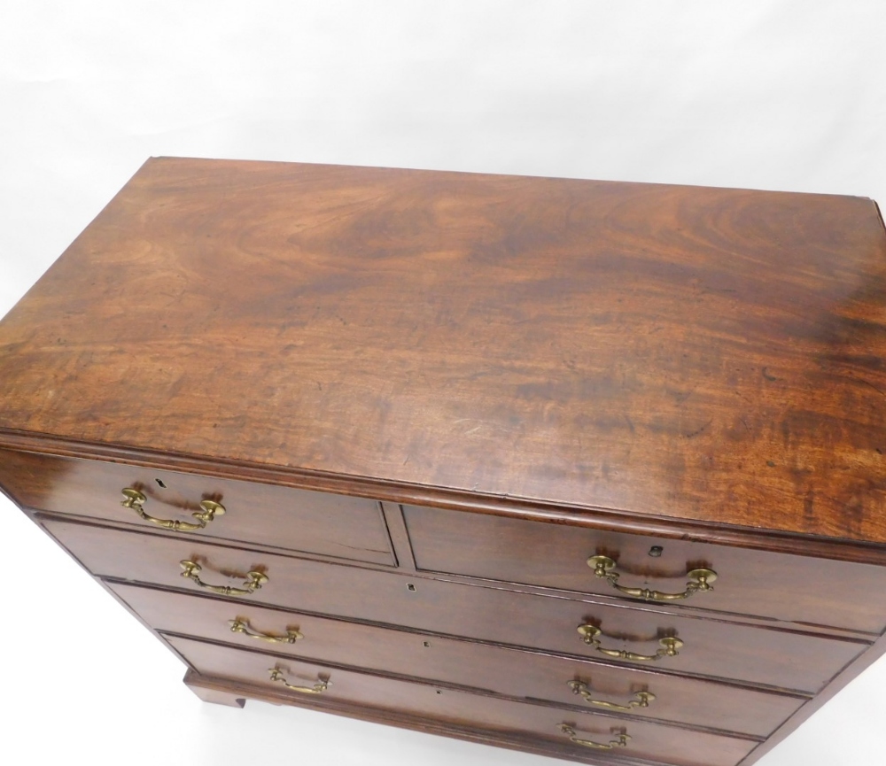 A George III mahogany chest of two short and three long cock beaded drawers, on bracket feet, 106cm - Image 2 of 2