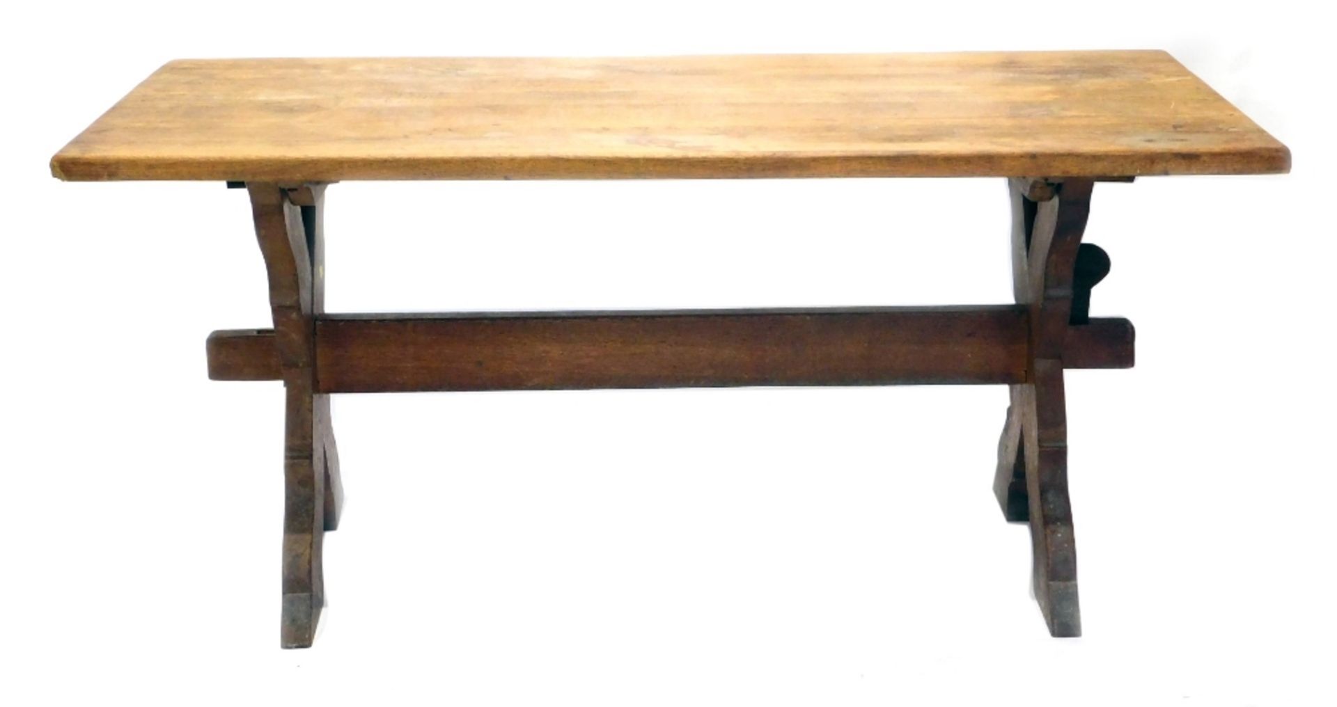 A 20thC oak refectory table, on shaped legs joined by heavy stretcher, 78cm high, 166cm wide, 85cm d