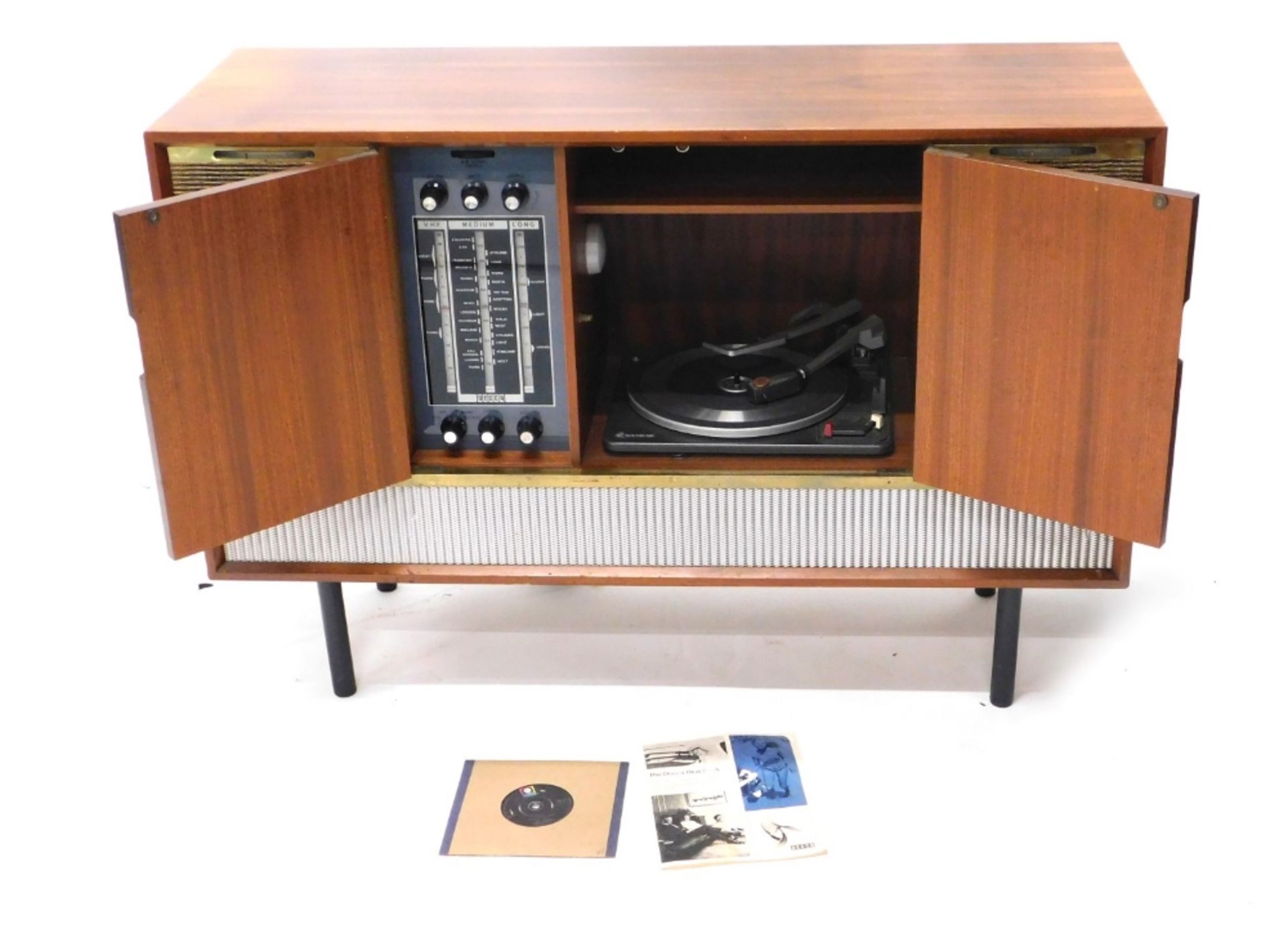 A Decca walnut cased radiogram, with Garrard turntable, 31cm wide, and Decca system, on turned legs,