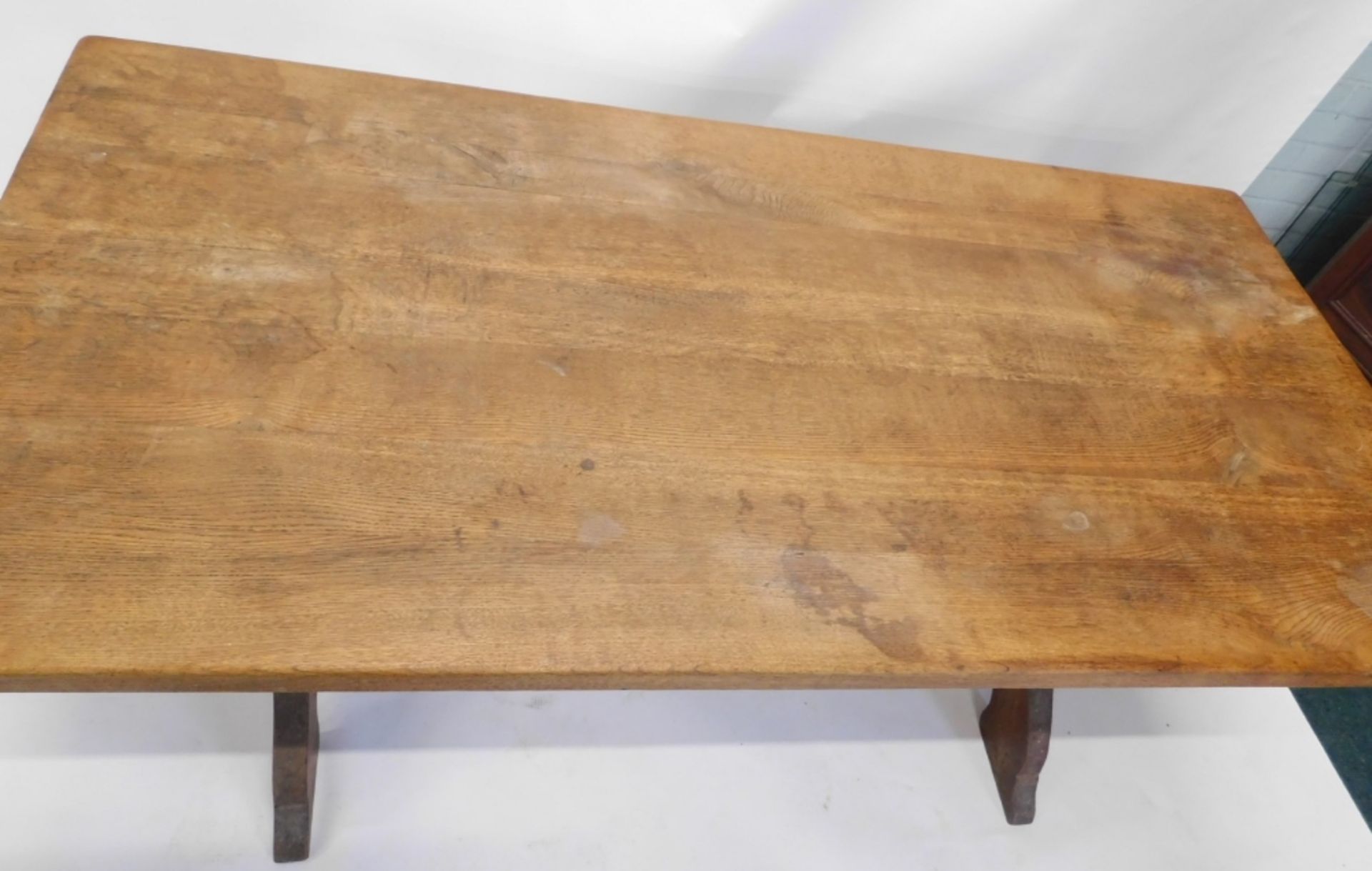 A 20thC oak refectory table, on shaped legs joined by heavy stretcher, 78cm high, 166cm wide, 85cm d - Image 2 of 2