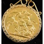 An Edward VII full gold sovereign dated 1910 pendant and chain, the sovereign in a 9ct gold mount, o