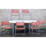 A vintage 20thC dining room suite, comprising oval table on heavy chrome circular legs, and a set of