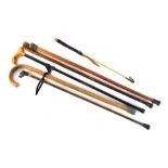 Various walking sticks, to include a dog head example, with turned bamboo style stem, 85cm high, hun