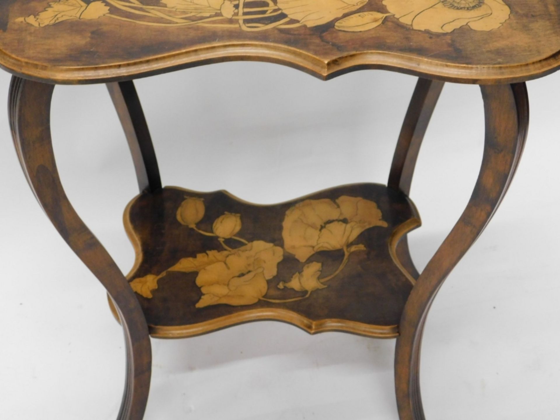 An early 20thC Arts and Crafts pokerwork occasional table, the shaped top decorated with flower hea - Image 3 of 3