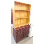 A pine open bookcase, and a side cabinet.