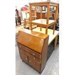 Two tile topped tables, and a bureau.