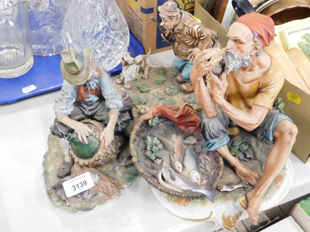 Three various Capodimonte figures.