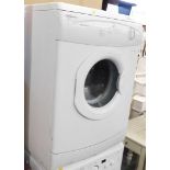 A Hotpoint Aquarius TDL30 tumble dryer.