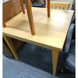 Dining table and a spindle back dining chair.