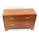A mahogany campaign chest, of two drawers, with brass handles and corner plates, raised on