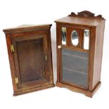 A Victorian mahogany side cabinet, with a glazed and mirrored door, raised on bracket feet, 95.5cm h