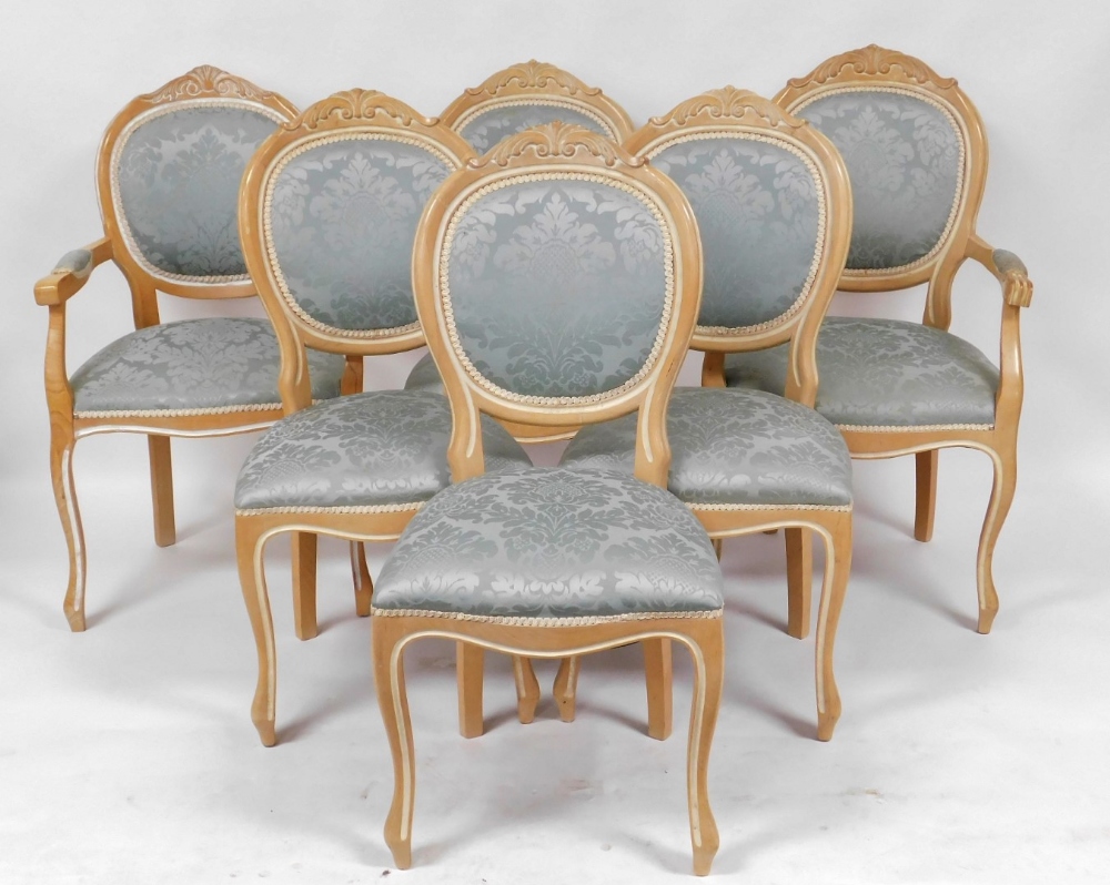 A set of six Victorian style pale beech balloon back dining chairs, upholstered in turquoise blue pa