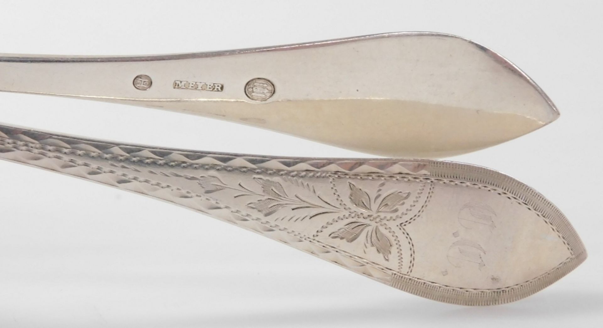 A set of ten Meyer Danish silver dessert spoons, foliate engraved, shield reserve monogram engraved, - Image 2 of 2