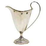 A Victorian silver helmet shaped cream jug, of octagonal form, William Aitken, Chester 1899, 3.26oz,