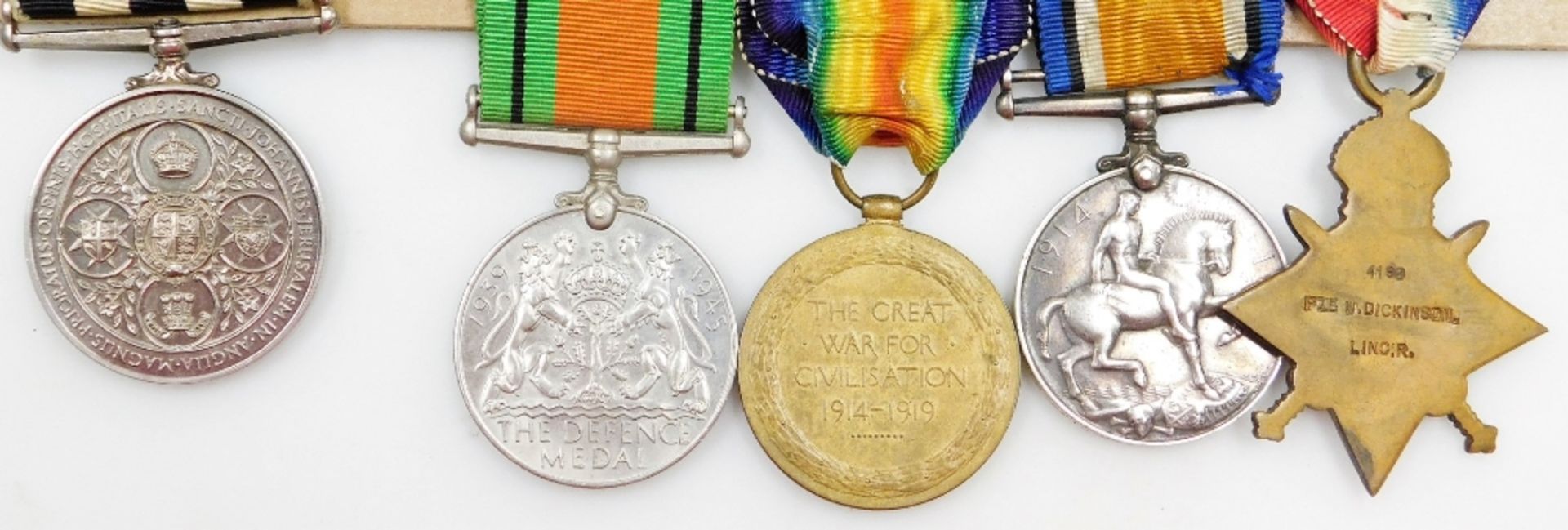 A World War I/II medal group, named to Pte W Dickinson, Lincolnshire Regiment, comprising 1914/15 St - Image 3 of 10