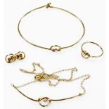 A 9ct gold and diamond set jewellery suite, to include bangle, stud earrings, necklace and dress rin