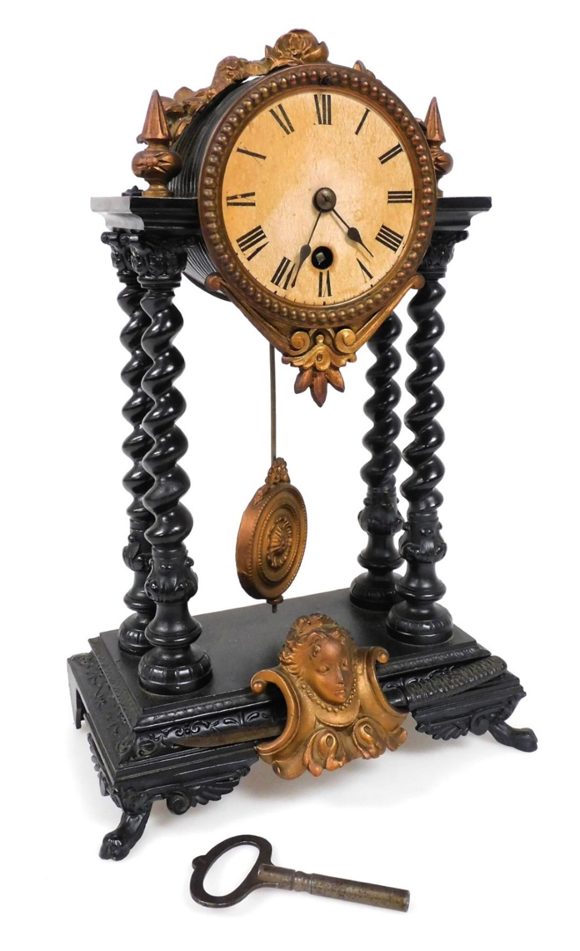 A late 19thC French cast iron and tin portico clock, circular white dial bearing Roman numerals, thi