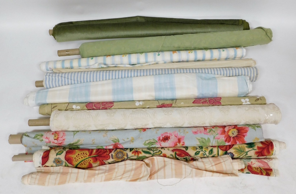 Various bolts of fabric, to include sage green velvet, blue and white stripe, floral, etc. (a quanti