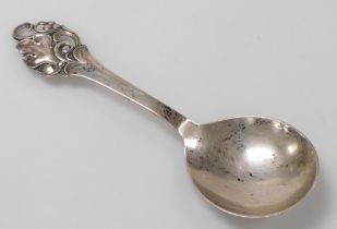 A Johannes Siggaard Danish silver fruit spoon, with vine terminal, engraved verso and dated 22.10.43