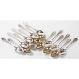 A set of fifteen Meyer Danish silver table spoons, foliate engraved, shield reserve monogram engrave