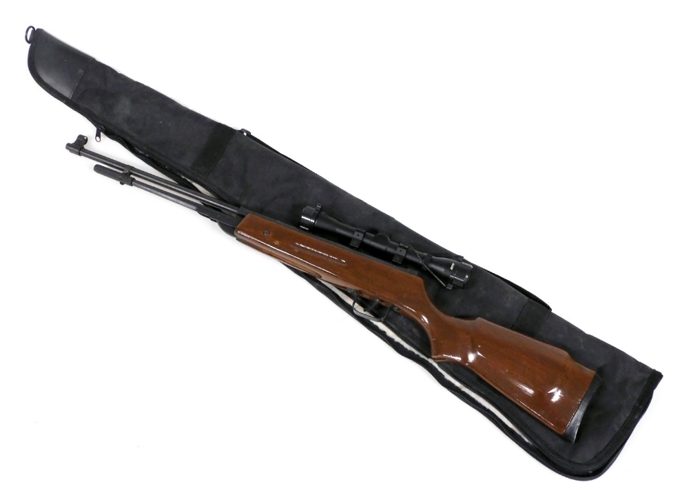 A B.A.M. air rifle, with a 4x32 gun sighting, cased.