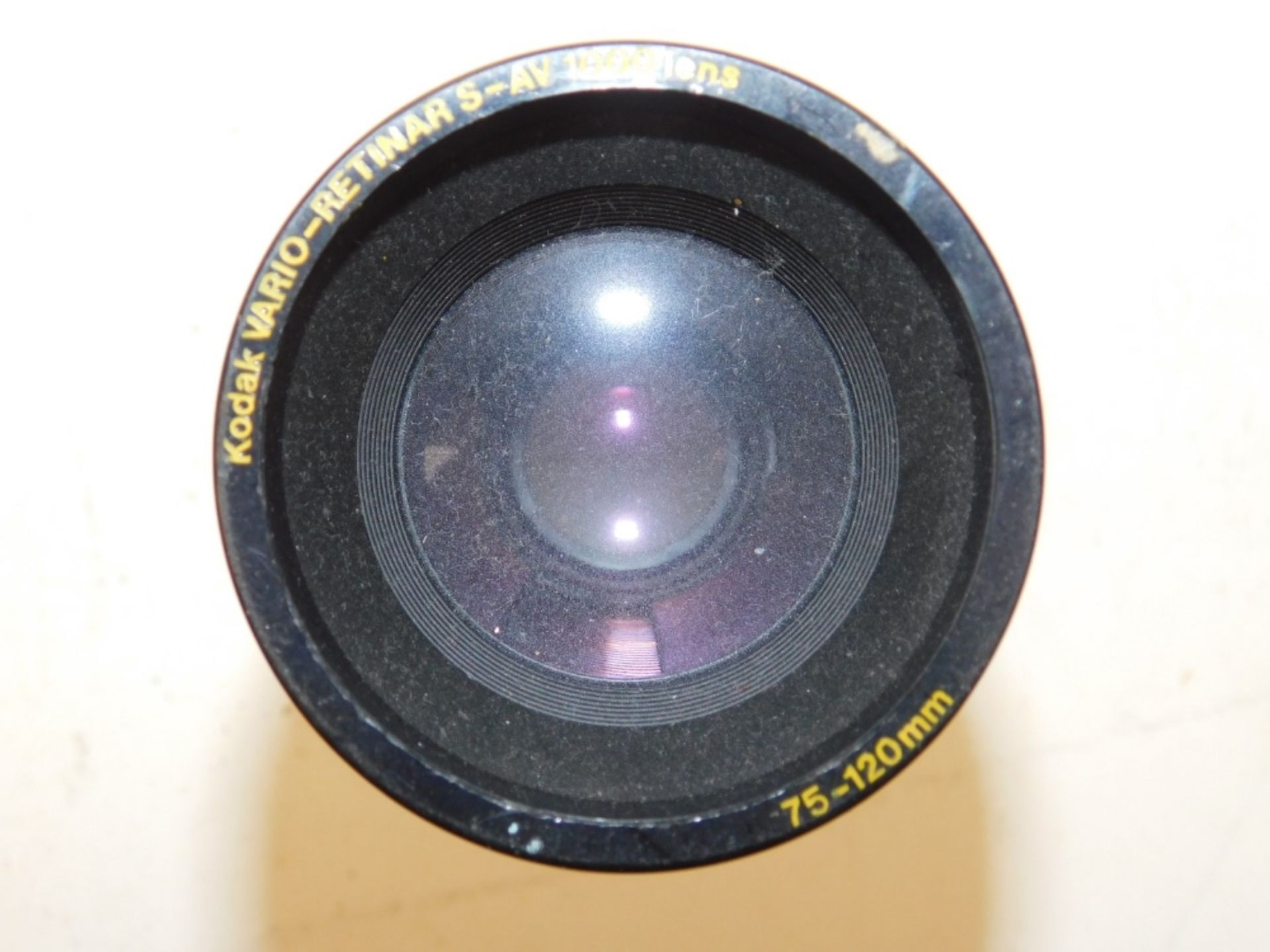 A pair of Skymaster 25x70 FOV-2.7 binoculars, pathescope binoculars, Kodak lens, lacquer box contain - Image 7 of 9