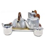 A Picquot ware four piece tea set, together with a twin handled tray and a kettle. (6)