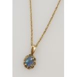 A 9ct gold and opal doublet pendant, on a fancy link neck chain, on a bolt ring clasp, stamped 9ct,