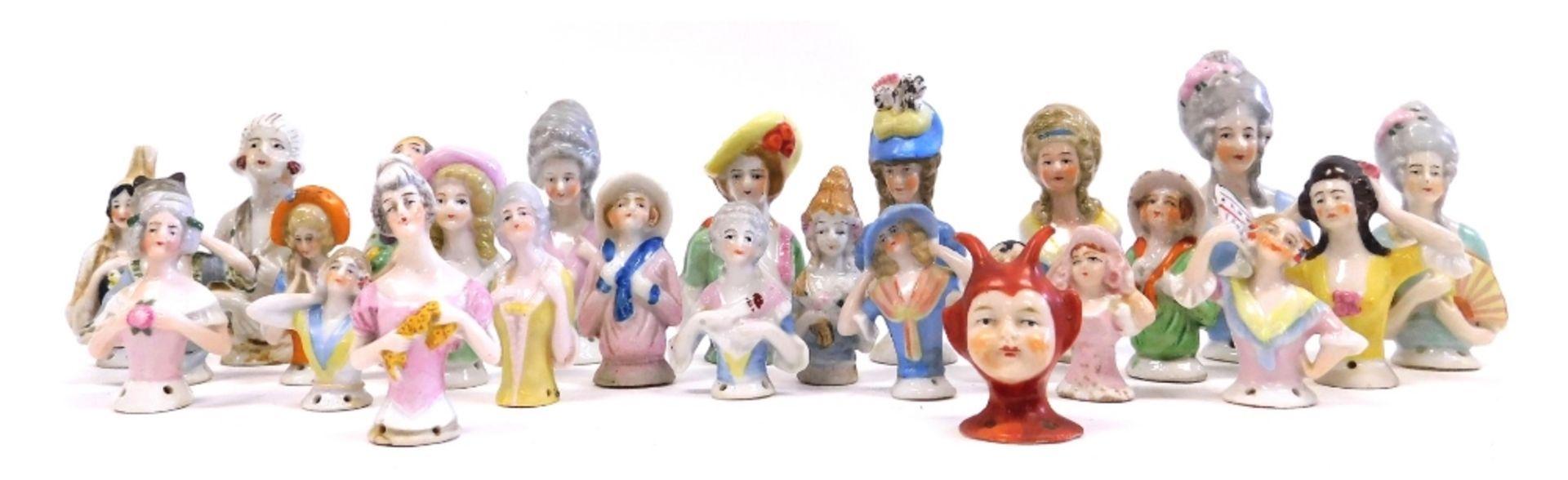 A group of Art Deco and Gainsborough lady type porcelain pin dolls, of varying designs. (1 tray)