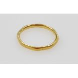 A 22ct gold wedding band, of octagonal form, size M/N, 2.2g.