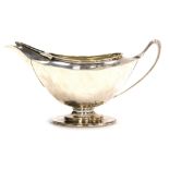 A George V silver boat shaped cream jug, Harrison Brothers & Howson (George Howson), Sheffield 1921,