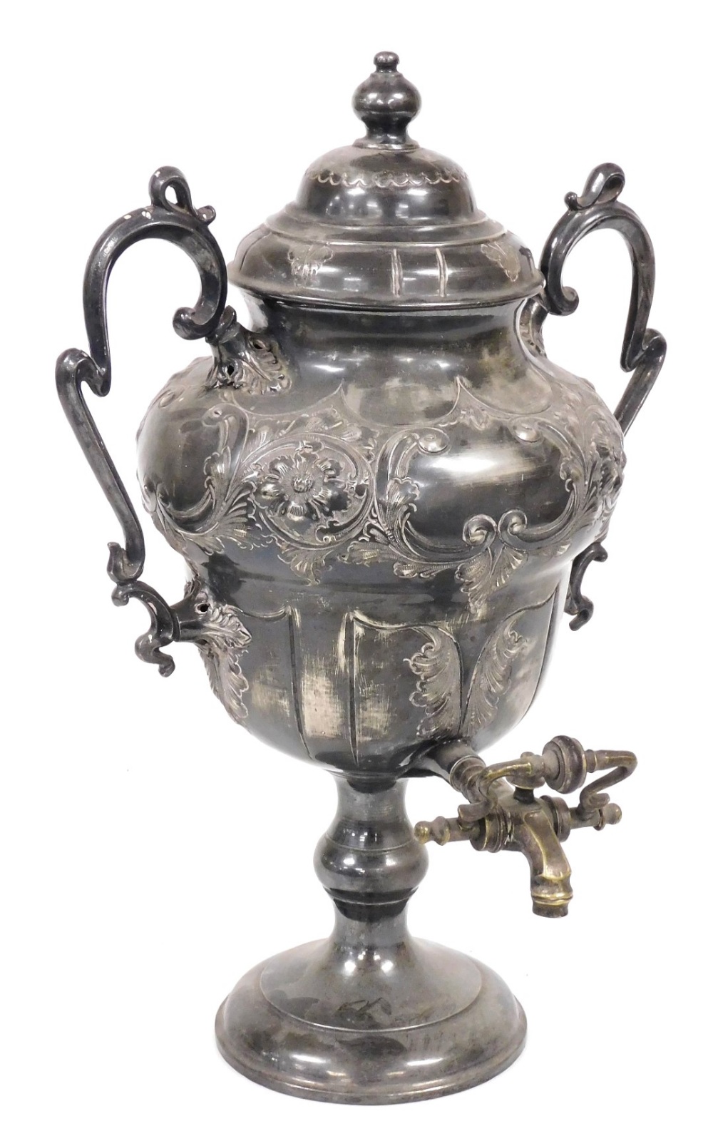 A Victorian silver plated tea urn and cover, of twin handled ogee baluster form, embossed with flowe