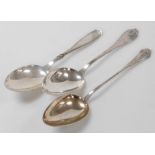 Three Danish silver table or basting spoons, each of differing design, by Christian Heise, and Johan