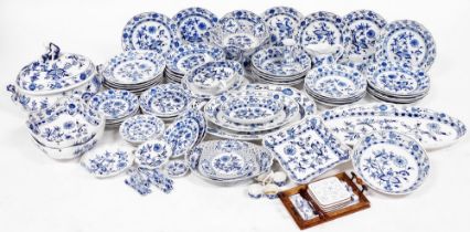 An early 20thC Meissen Onion pattern blue and white porcelain dinner and dessert service, comprisin