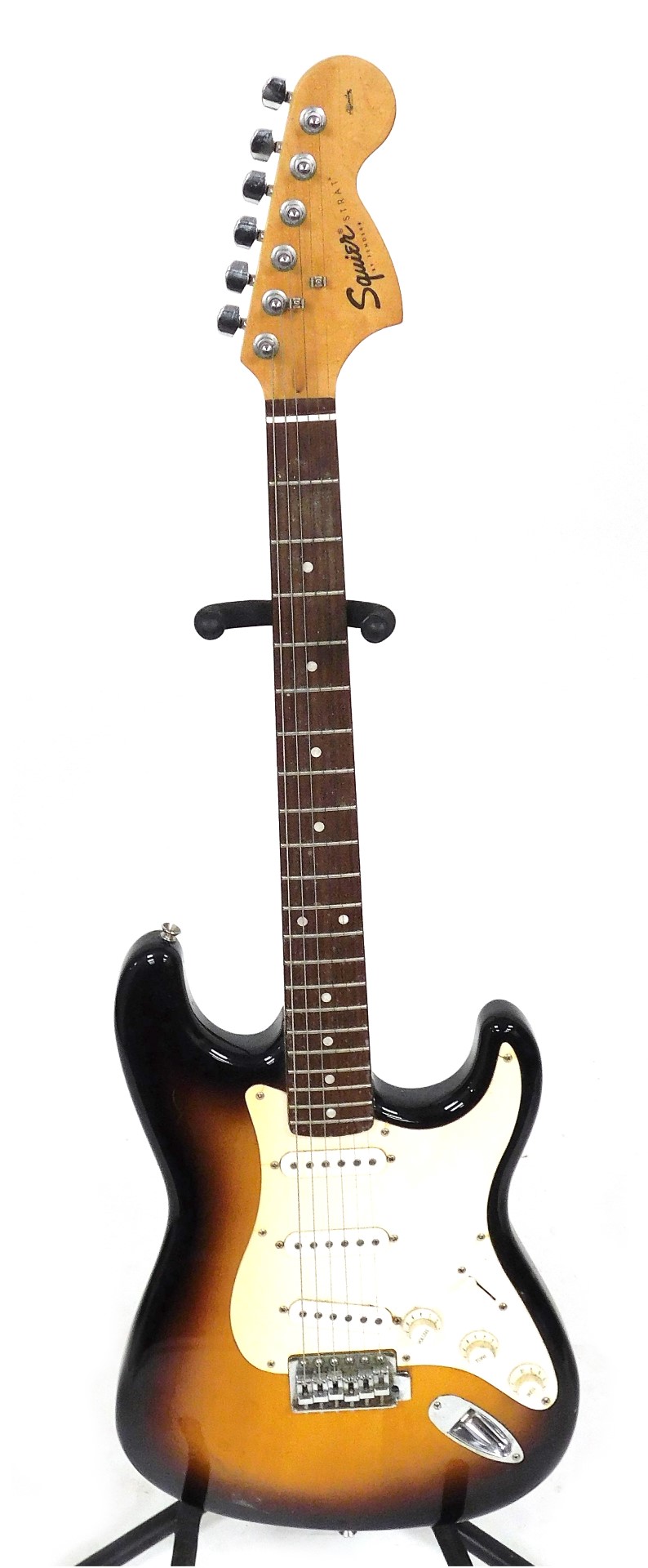 A Fender Squier Strat electric guitar, 20th Anniversary Special Edition, with graduated brown and cr